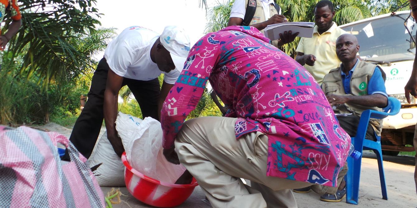 Oxfam distributing rice, beans and flour to about 4,525 people during the Ebola outbreak in Equateur province.