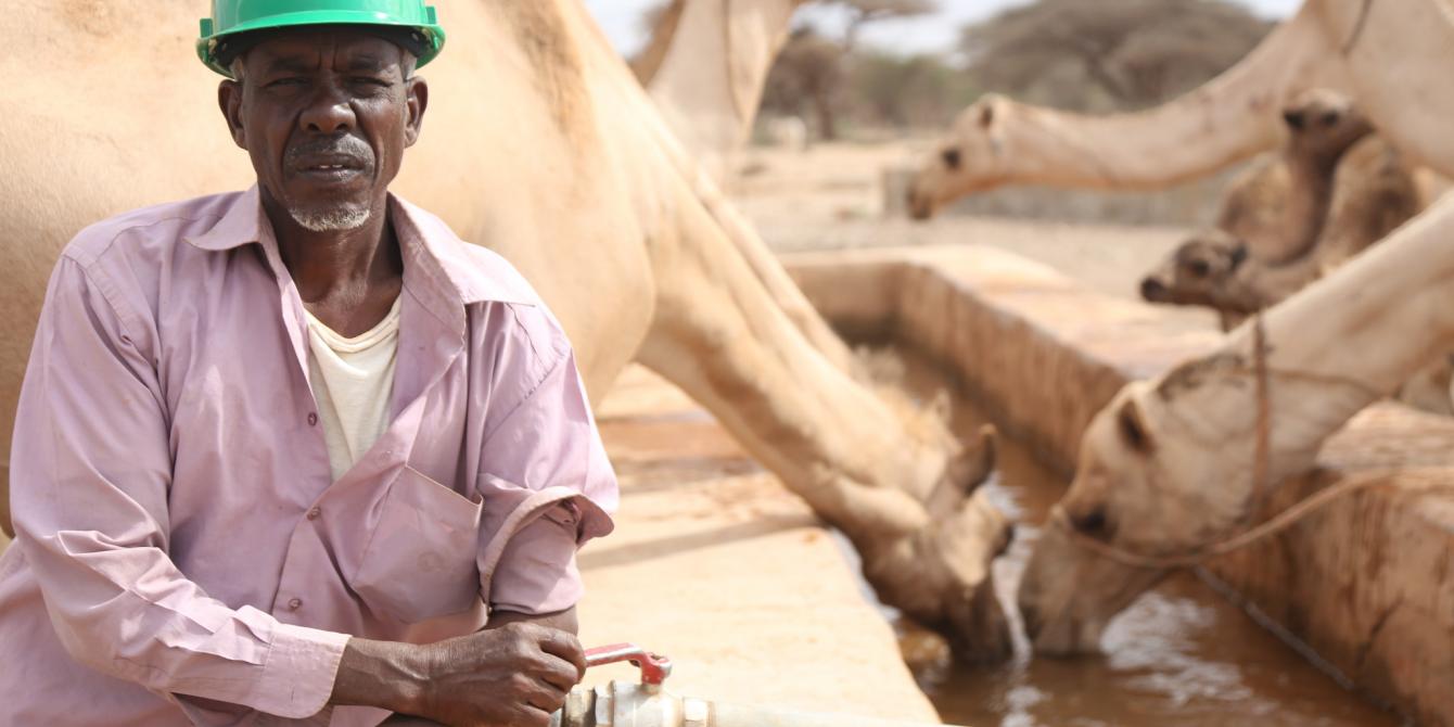 Mataa Abokor uses the solar water system installed by Oxfam. Dustin Barter/Oxfam