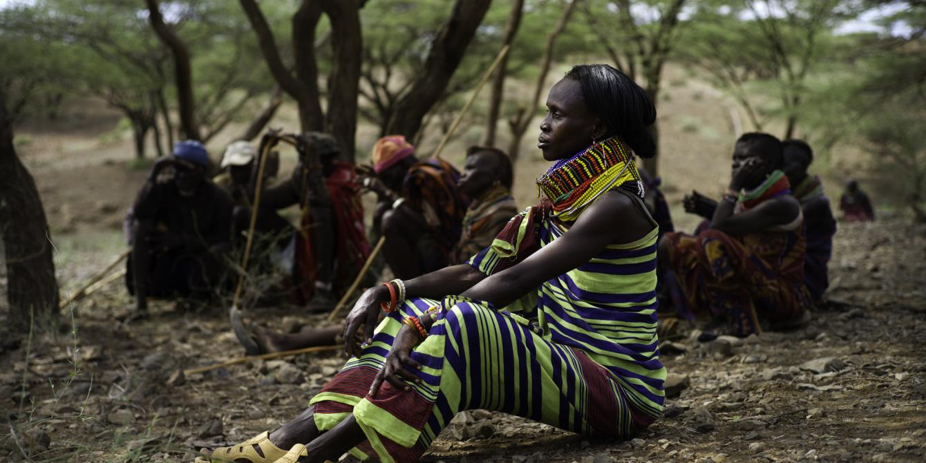 Testing Community Consent Helen Ewoton (48) sits with other villagers as a drill team bores a hole for fresh water in the village of Nawoyatir in the Lapur district of Lokitaung in Turkana. Kieran Doherty/Oxfam