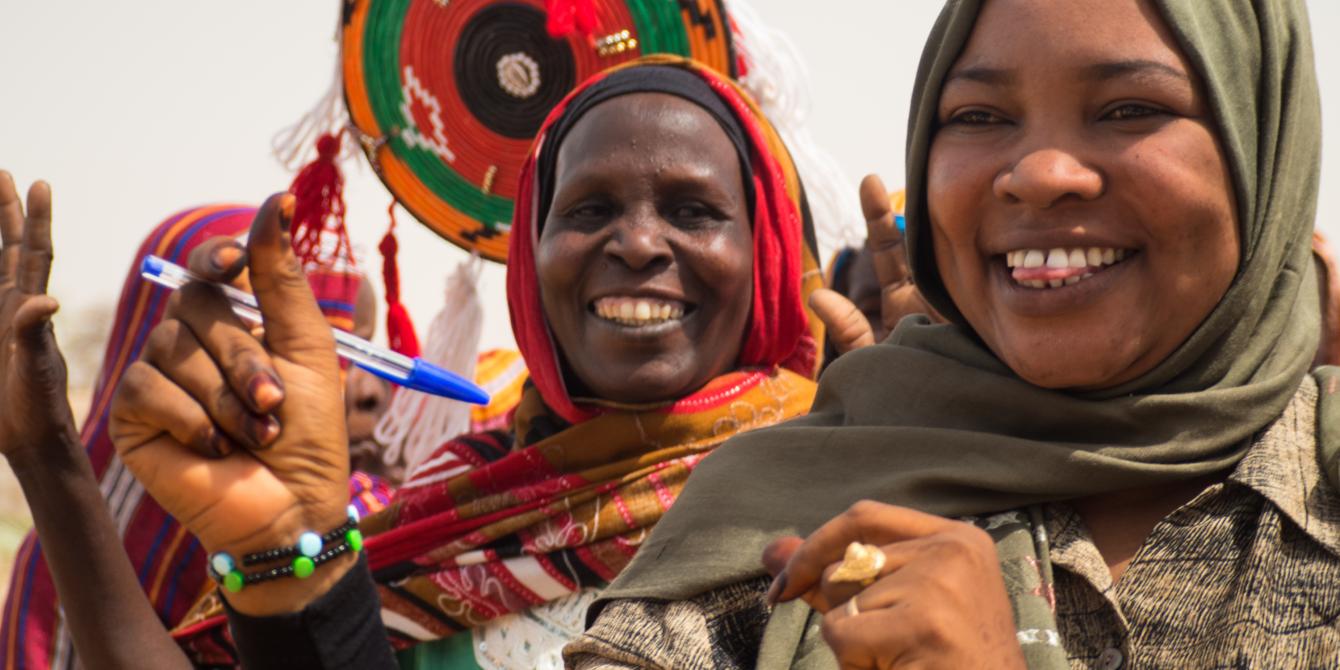 Women celebrating in Sudan. Elizabeth Stevens/Oxfam