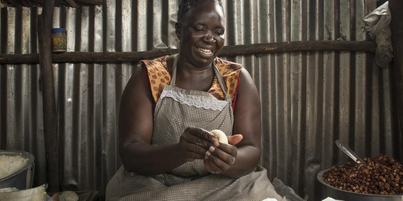 Rose Wasiaya, 39, at her chapatti business in Korogocho, an informal settlement in Nairobi, Kenya. Photo Credit: Katie G. Nelson/Oxfam Rose Wasiaya, 39, at her chapatti business in Korogocho, an informal settlement in Nairobi, Kenya. Photo Credit: Katie G. Nelson/Oxfam