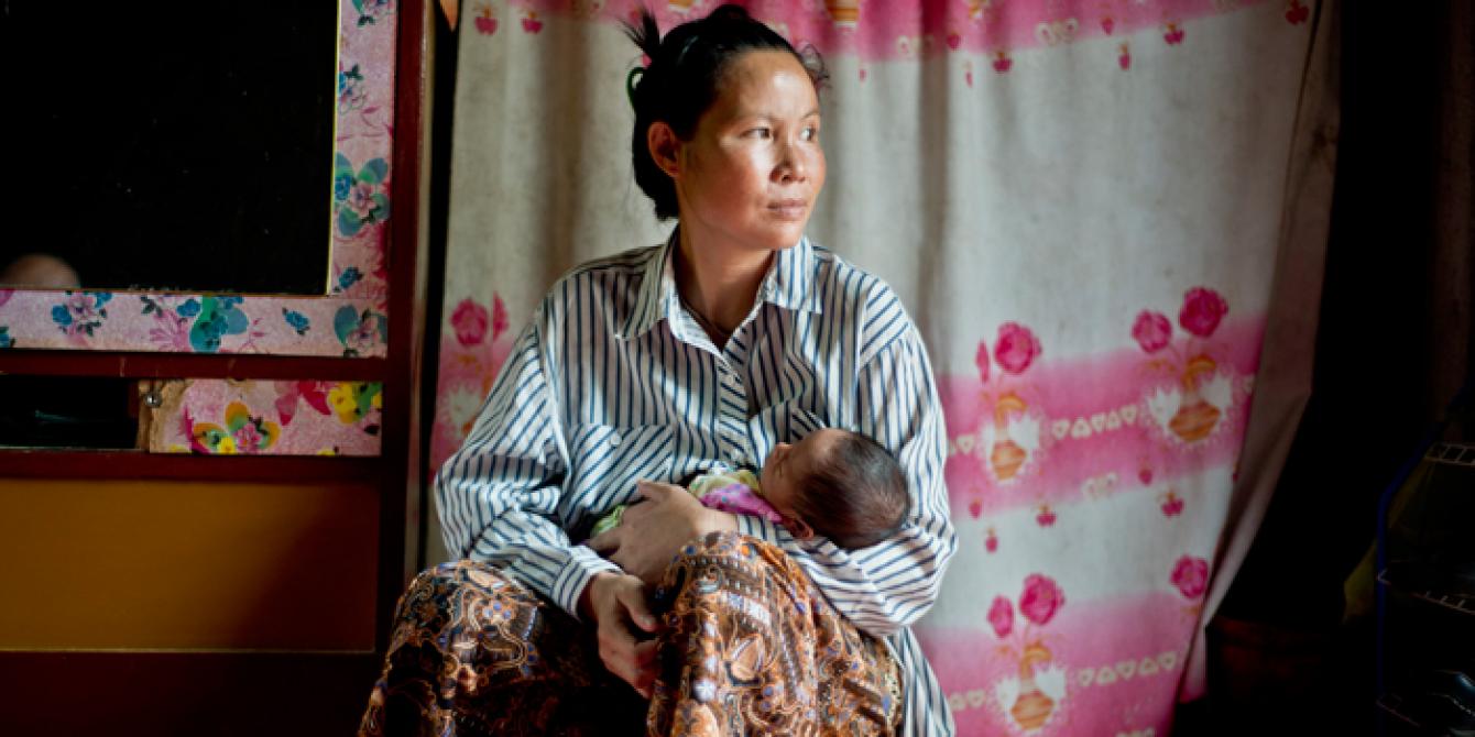 Gender Justice Young mother with baby