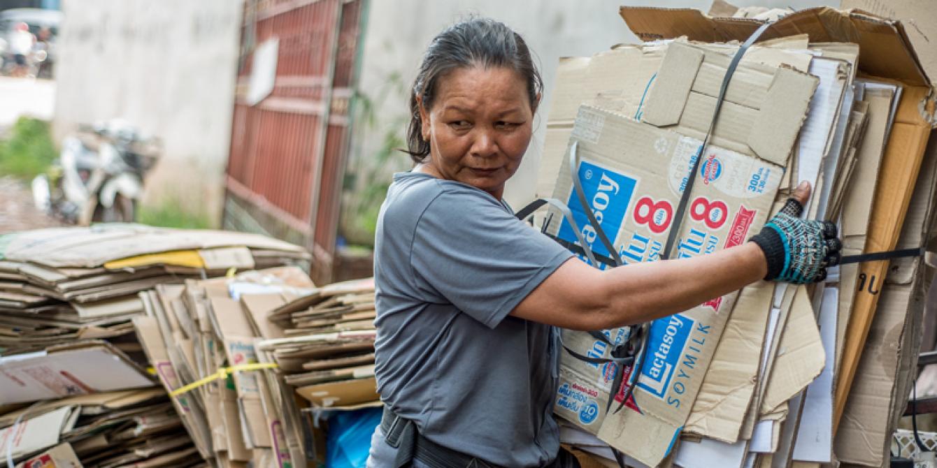 Saving Groups by Informal Workers, for Informal Workers Ms. Thong shows her waste cart