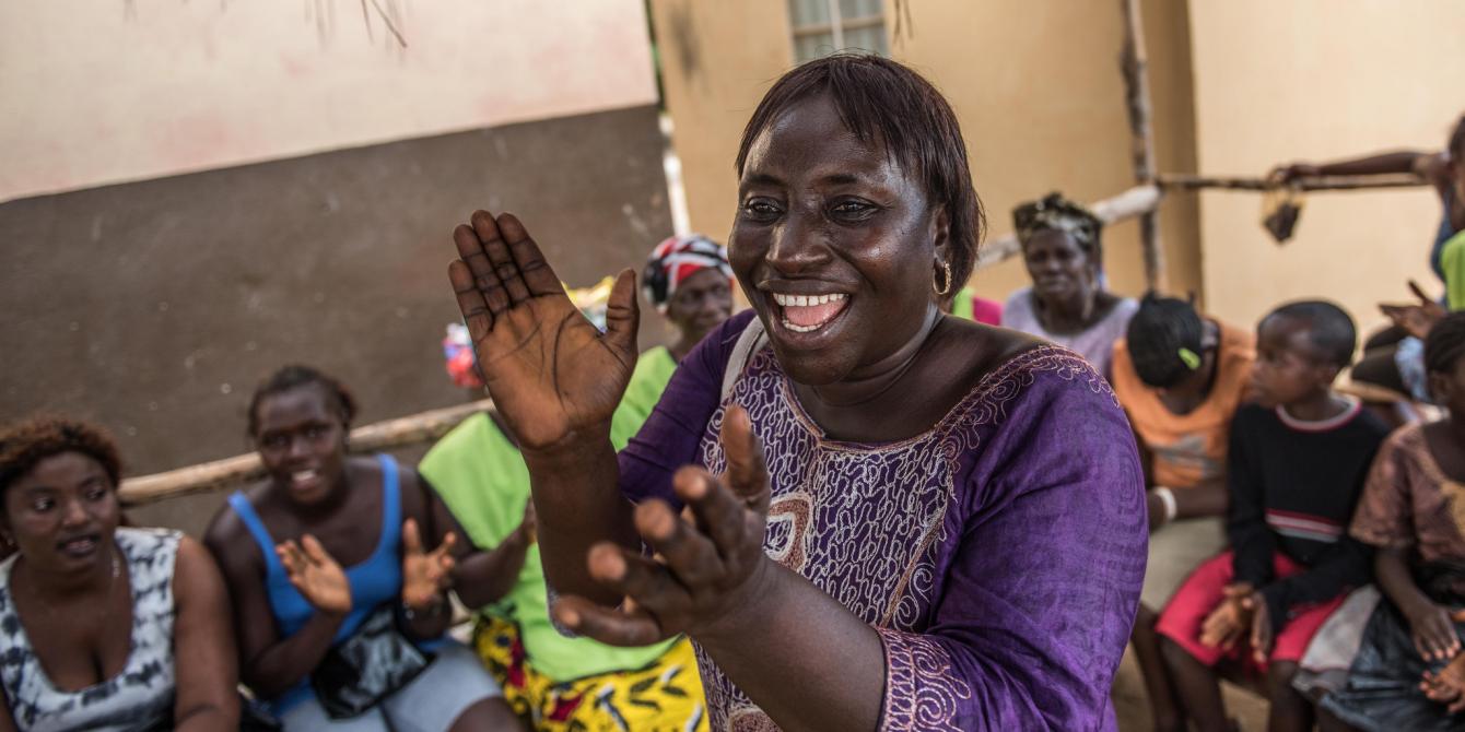 Women taking part in community dialogue forum Gender Justice and Women’s Rights