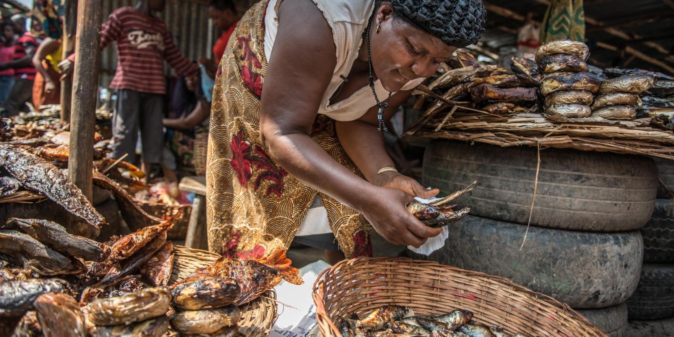 Elizabeth Bagra is a fish vendor at sidiga market in Kinshasa Elizabeth Bagra is a fish vendor at sidiga market in Kinshasa