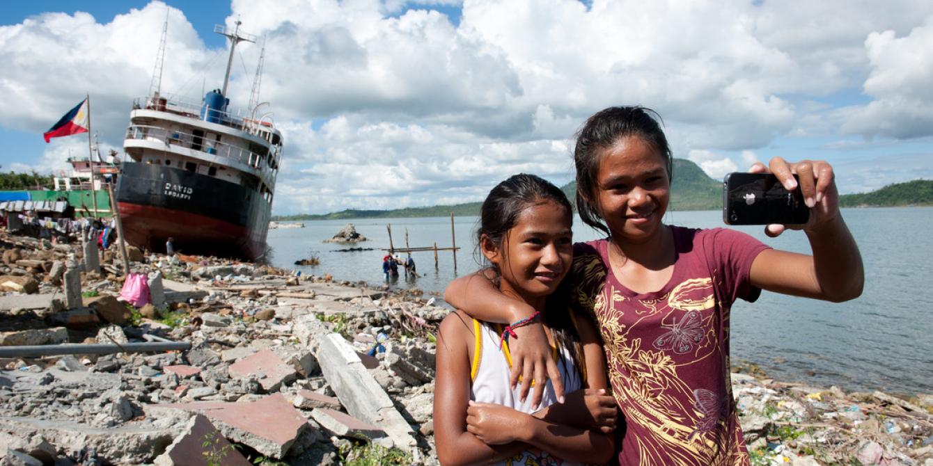 Mary Ann (10) and Mary Grace (14) stand in front of Anibong Bay in Tacloban. Both girls are recipients of Oxfam Hygiene Kit in January 2014. (Photo: Eleanor Farmer/Oxfam) Mary Ann (10) and Mary Grace (14) stand in front of Anibong Bay in Tacloban. Both girls are recipients of Oxfam Hygiene Kit in January 2014. (Photo: Eleanor Farmer/Oxfam)