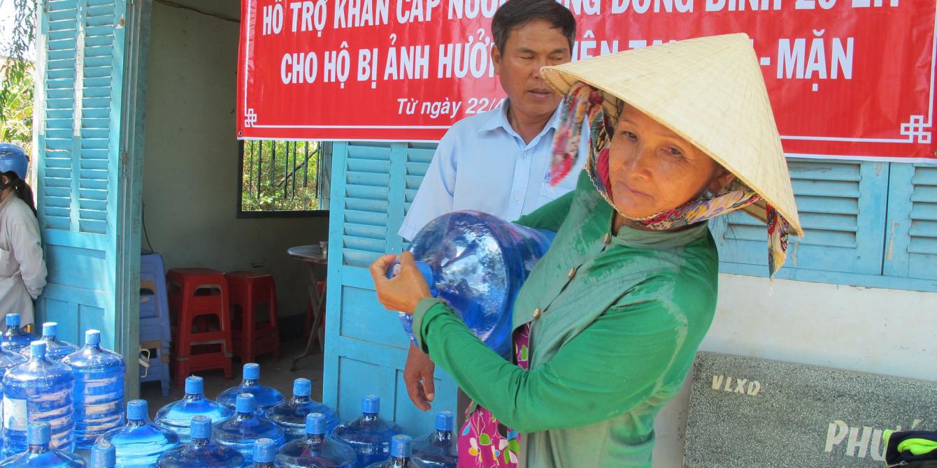 Rural women carries water in Ben Tre province. Credit: Oxfam Vietnam Rural women carries water in Ben Tre province. Credit: Oxfam Vietnam